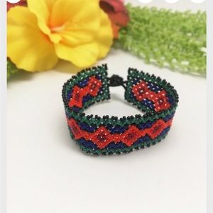 Handmade orange black and blue Beaded Huichol bracelet